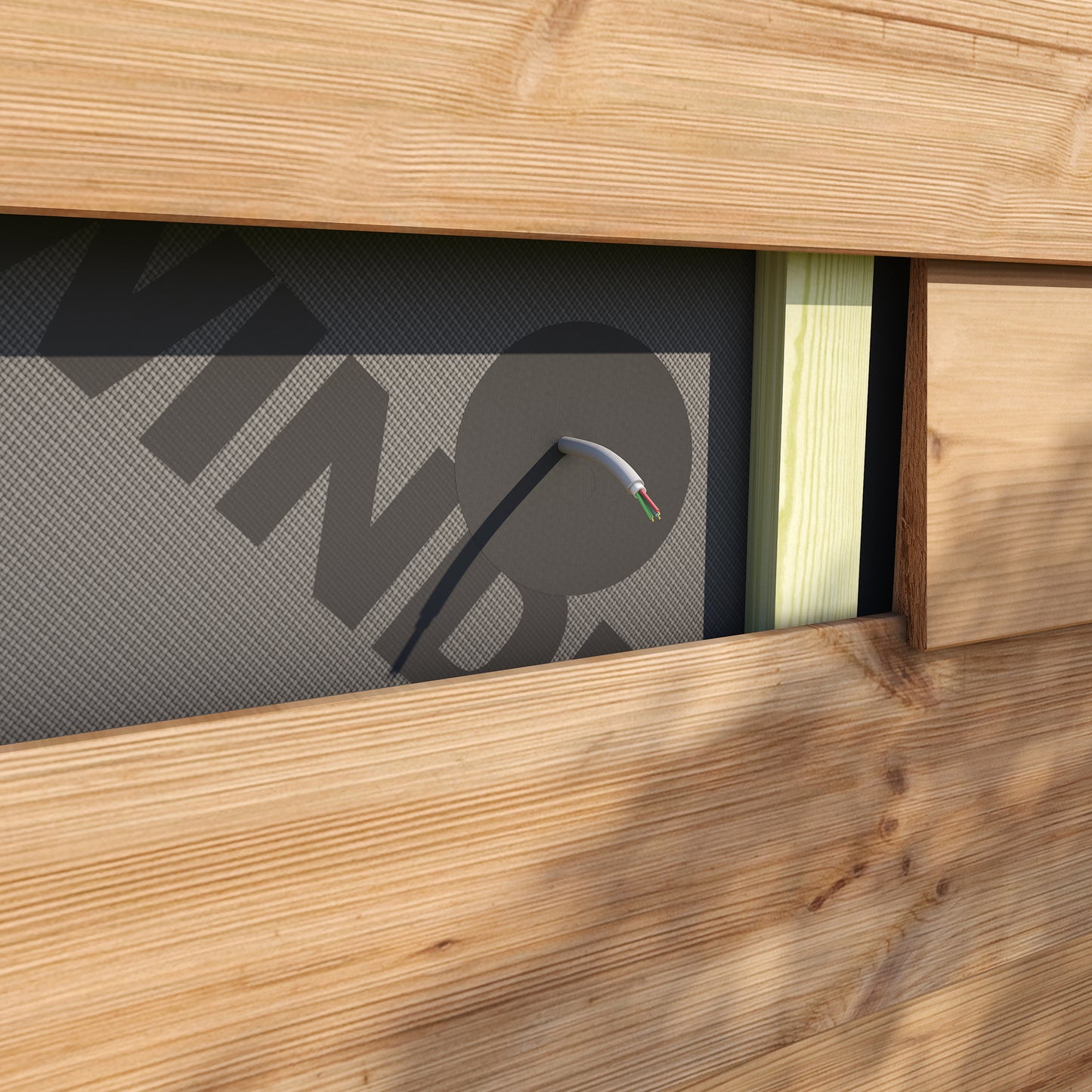DAFA TriFlex Airtight Grommet installed behind exterior timber cladding, sealing a single cable through a vapour control layer for airtight and weatherproof performance.