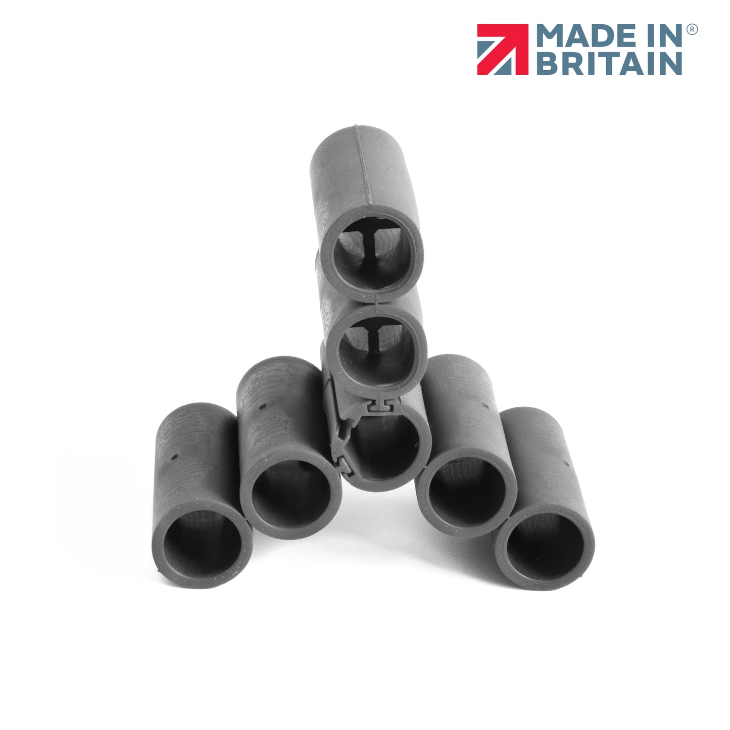 Stacked DuctSeal FR fire-rated sealing sleeves displayed on a white background, showcasing product shape and design, with the ‘Made in Britain’ logo above.